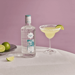 CleanCo Clean T Alcohol Free Spirit with Margarita cocktail lime and salt rim on table